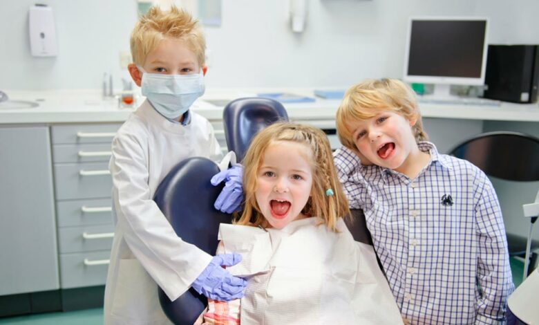 Children Smiling in Dental Clinic - Aurora Pediatric Dentist