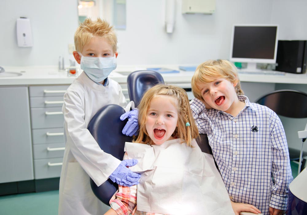 Children Smiling in Dental Clinic - Aurora Pediatric Dentist